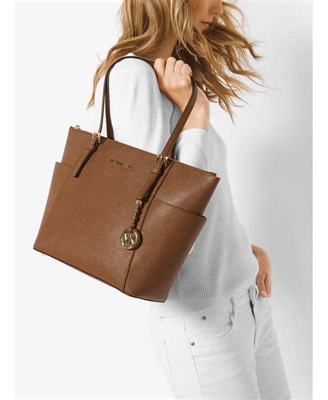 michael kors handbag jet set east west top zip tote|michael kors saffiano tote.